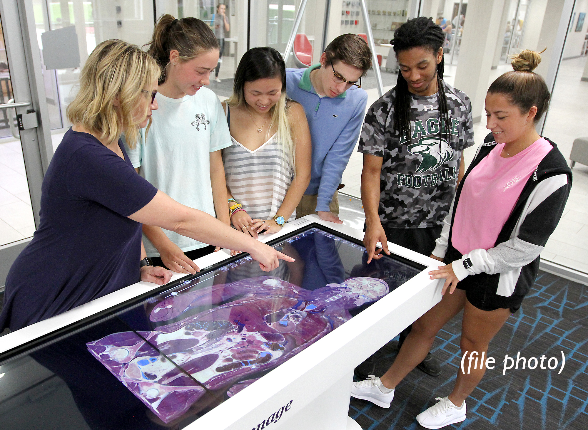 Pre-Med students watching Anatomage table demonstration