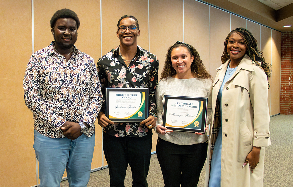 Award winners J.T. Taylor and Mackenzie Hustead with AASU officers Jaylon Lewis and Claireece Cross