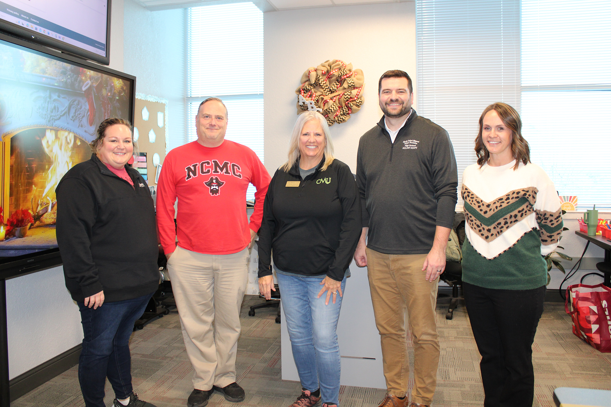 Staff from CMU and NCMC pose for photo