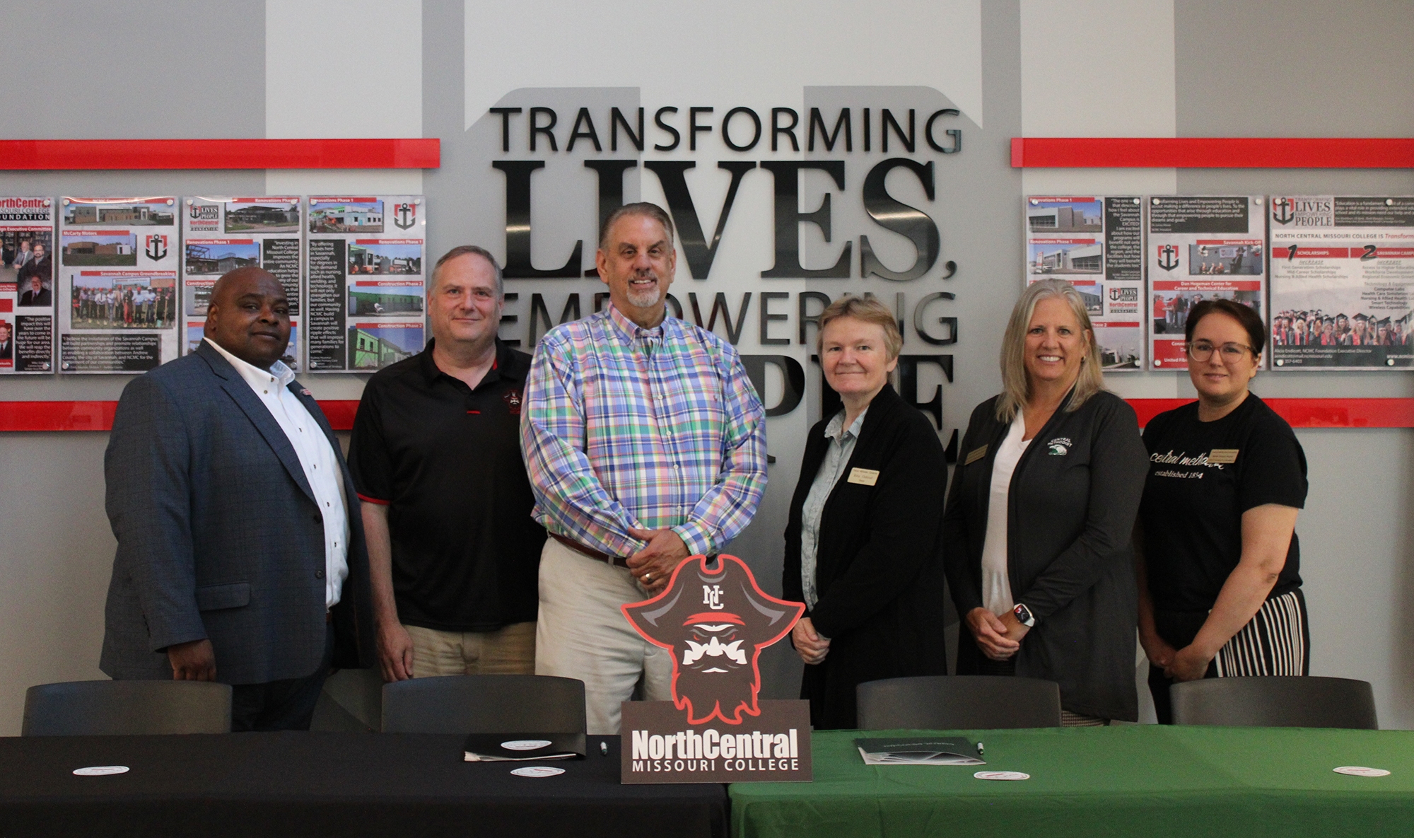 NCMC and CMU officials at signing