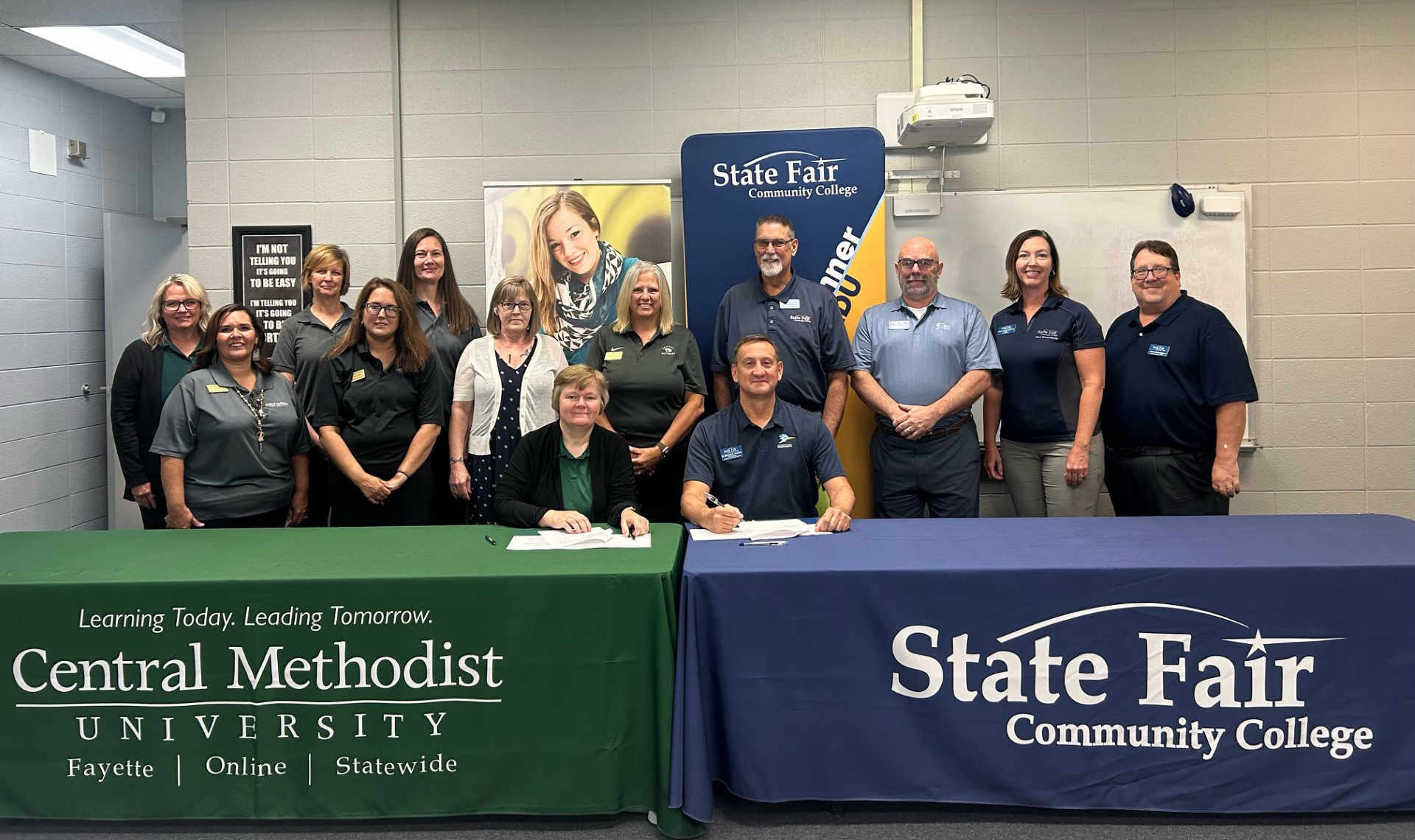 CMU and State Fair Community College officials at agreement signing event