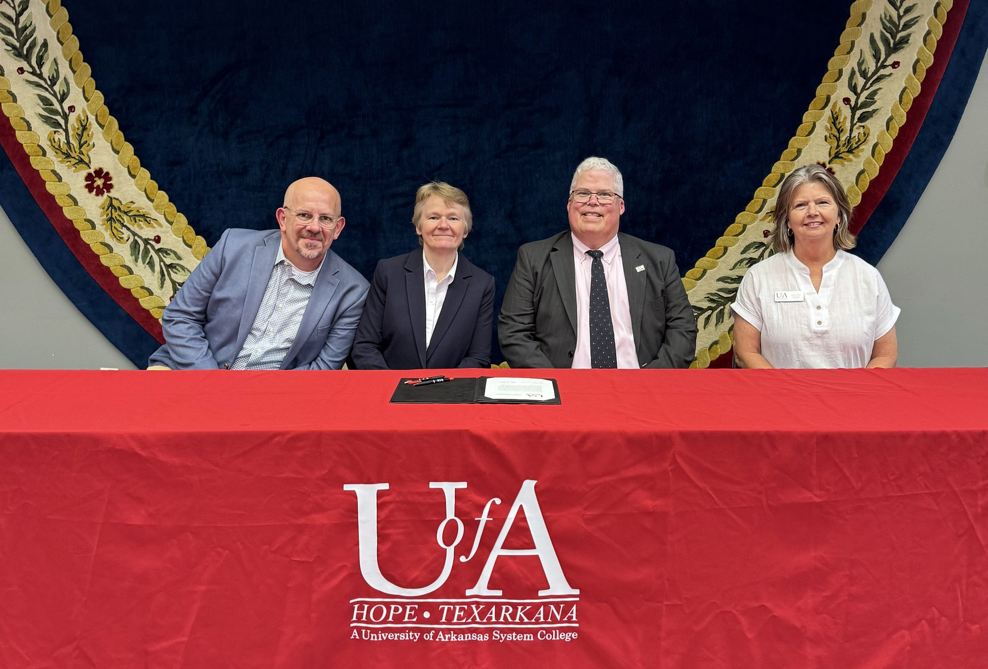 David Gordon, CMU Associate Dean of Academic Partnerships; Dr. Rita Gulstad, CMU Provost; Dr. Ricky Tompkins, UAHT Chancellor; and Laura Clark, UAHT Vice Chancellor for Academics