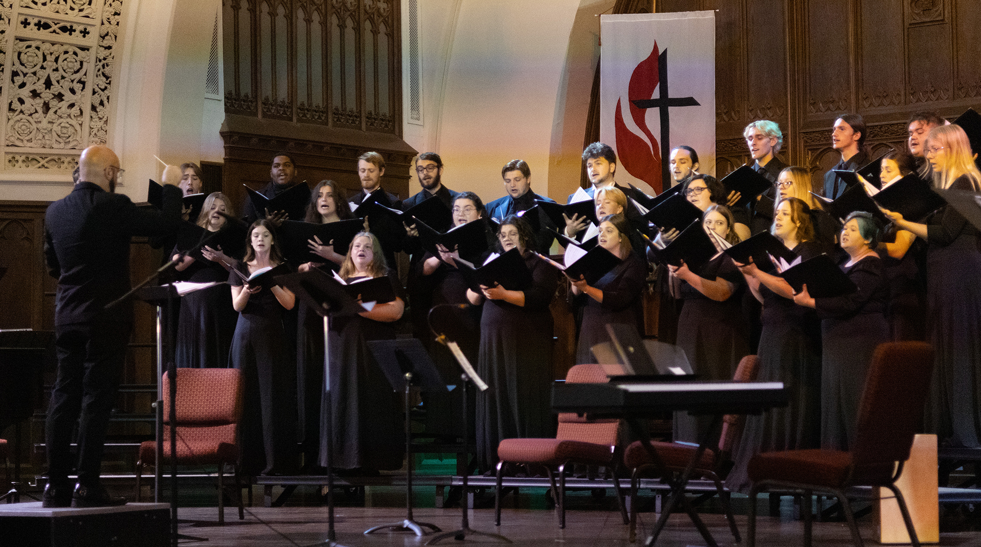 CMU choir performing in Linn Memorial UMC